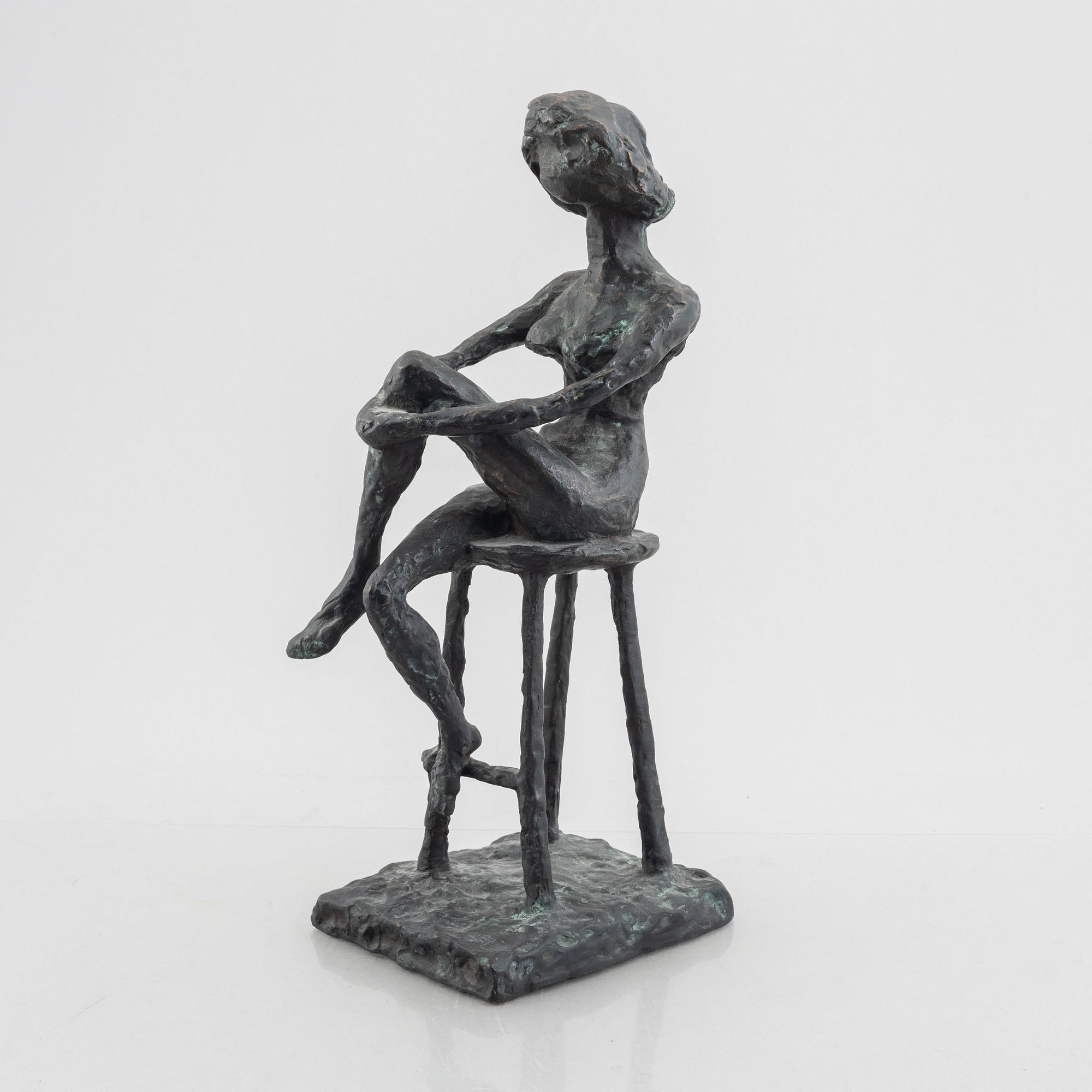 Inga Bagge, A seated woman.