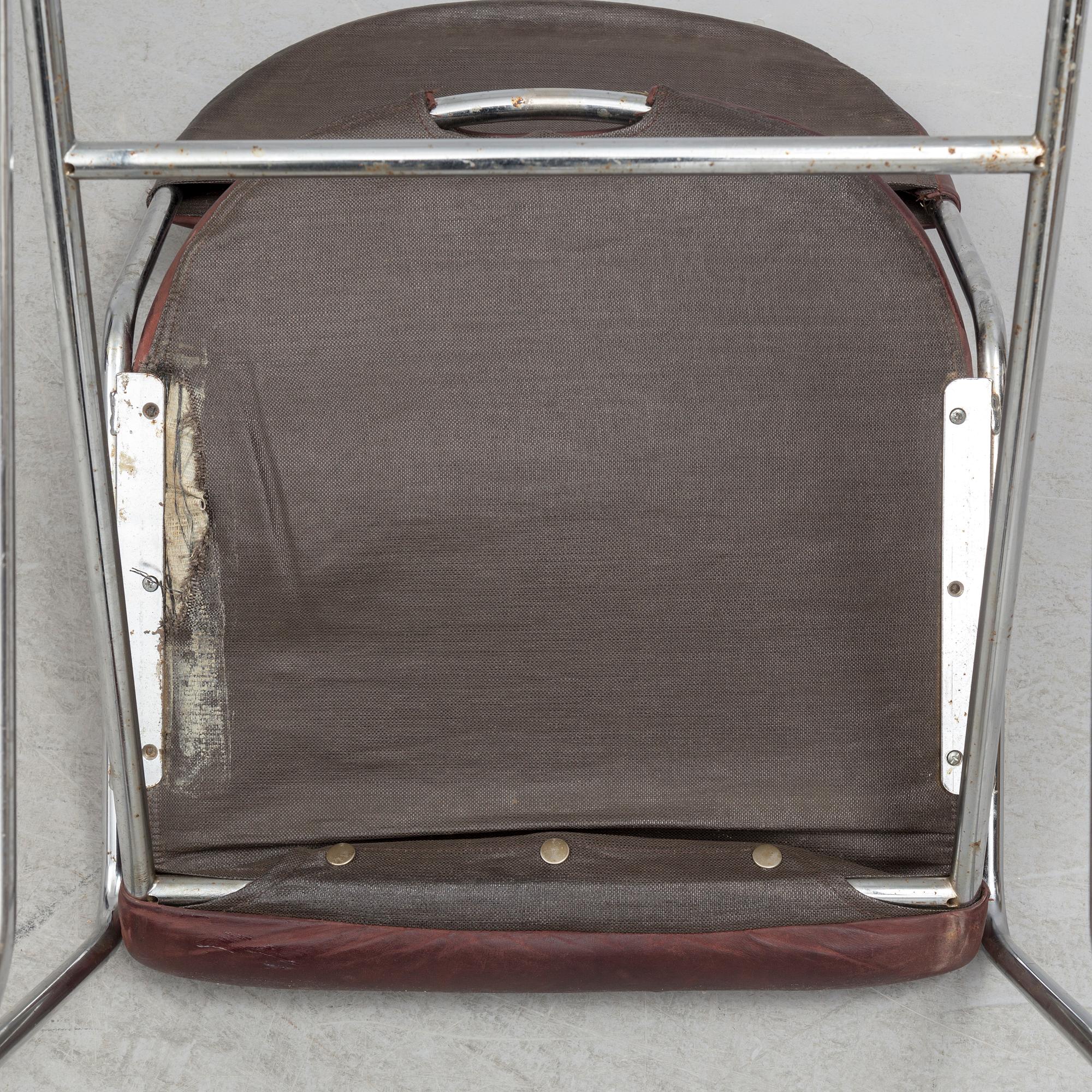 A set of four chairs by Sam Larsson, Dux, late 20th century.