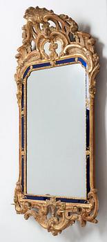 A Swedish Rococo two-light girandole mirror by Johan Åkerblad, dated 1769.