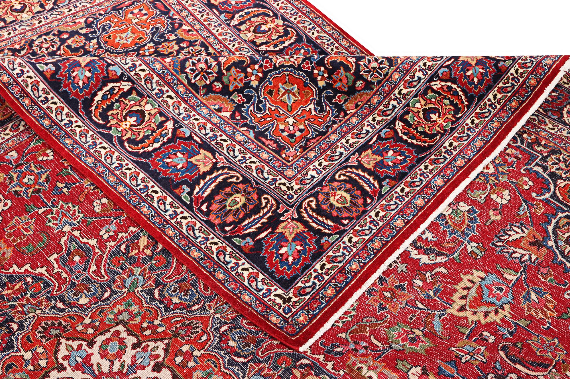 A Meshed carpet, c. 352 x 250 cm.