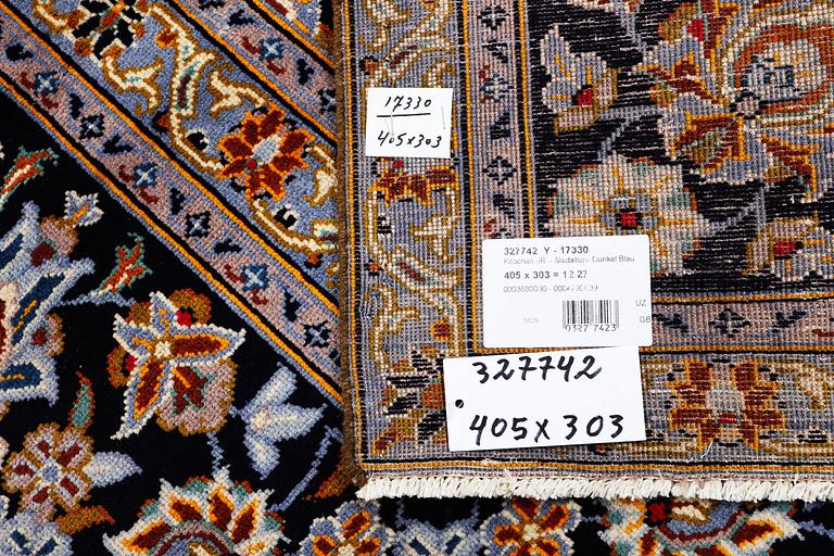 A carpet, Kashan, c. 405 x 303 cm.