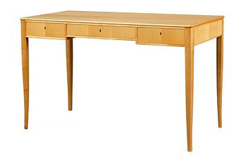 545. A Carl Malmsten beech desk, "Guldheden".