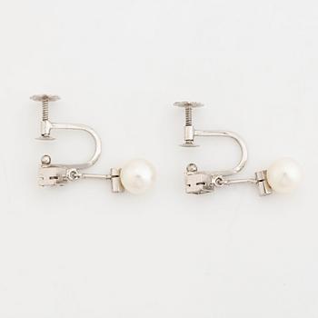 Cultured pearl and diamond earrings.