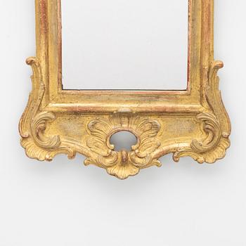 A giltwood rococo mirror, Stockholm, later part 18th century.