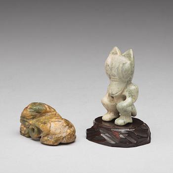 Two archaistic stone sculptures.