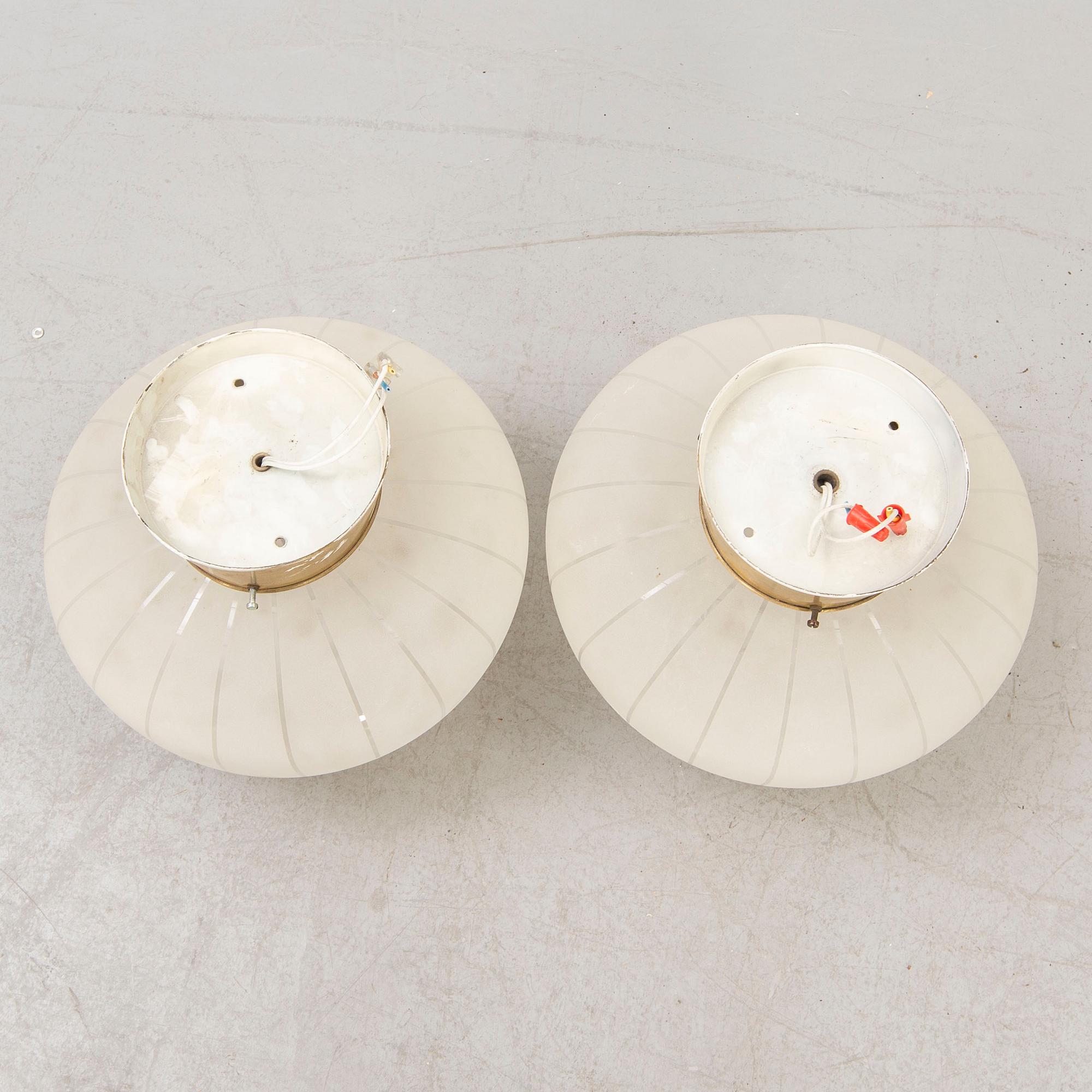 A pair of 1940/50s wall/ceiling lamps.