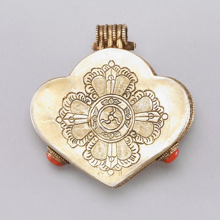 A filigree and jewelled Sinotibetan pendant/box, late 19th Century.