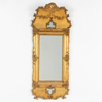 A late 19th Rococo style century mirror.