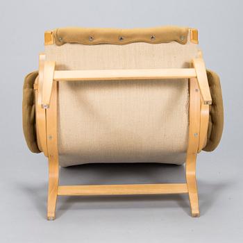 Bruno Mathsson, A "Pernilla" armchair with footstool, for DUX, designed in 1944.