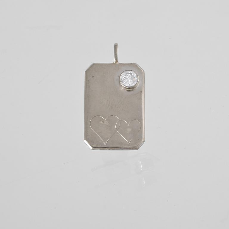 HÄNGE, 18K vitguld med briljantslipad diamant ca 0.23 ct, Jarl Sandin, Göteborg 1983. Vikt 4,2 gram.