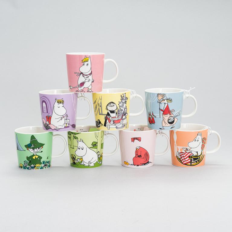 Eight Moomin Characters mugs in vitro porcelain, Arabia, Finland.