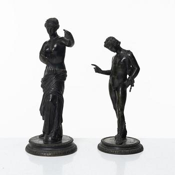 Two bronze sculptures.