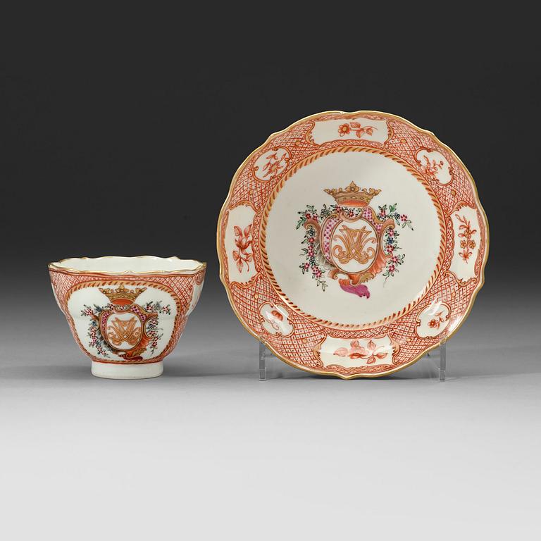 A export cup and saucer with a crowned cartush and monogram in famille rose, Qing dynasty Qianlong (1736-1795).