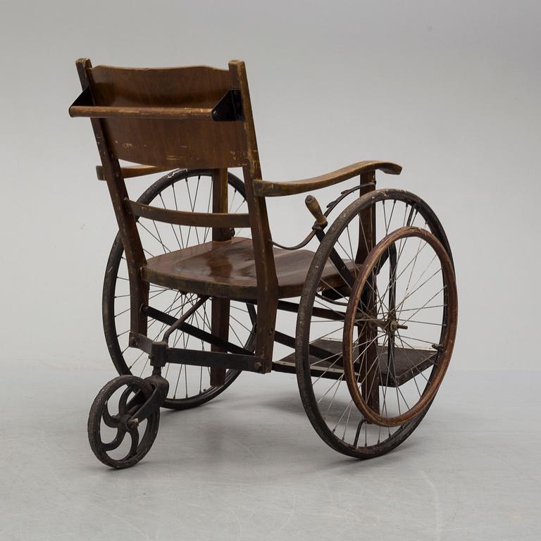 An early 20th century wheel chair.