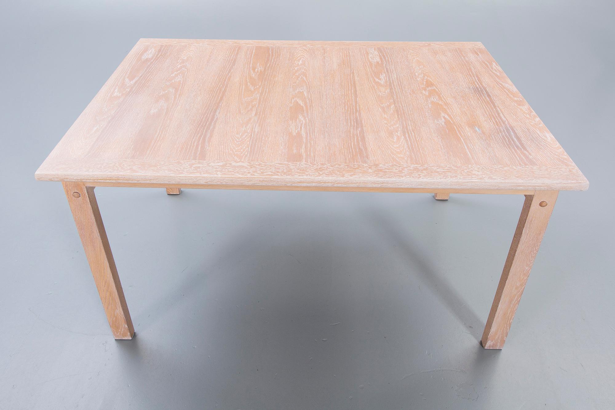 A Danish 1960s dining table and 6 chairs,