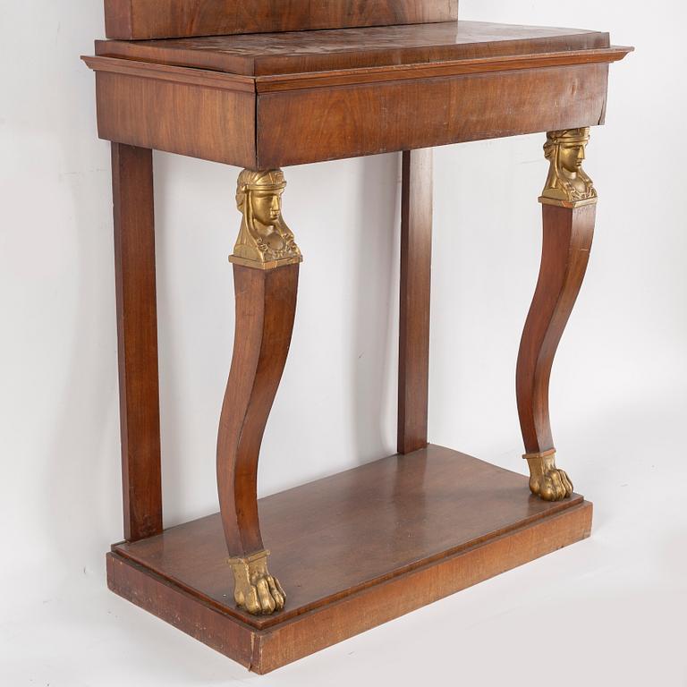 A Swedish Empire mirror and console table, first half of the 19th century.