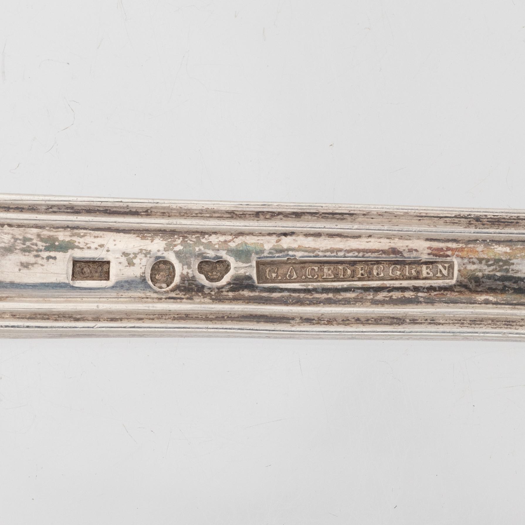 A set of 19 silver cutlery parts, including Gustaf Möllenborg, Stockholm 1888.