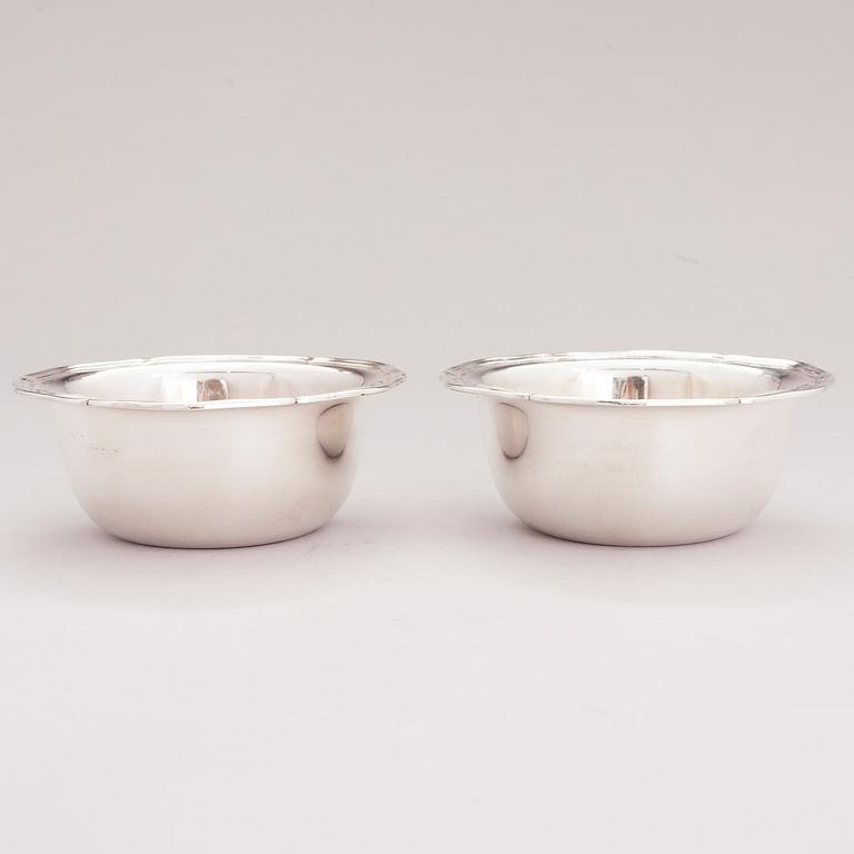 A lidded silver sugar bowl and a set of six silver bowls, Germany.