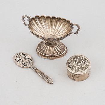 Goblet on foot, hand mirror, and box, silver.