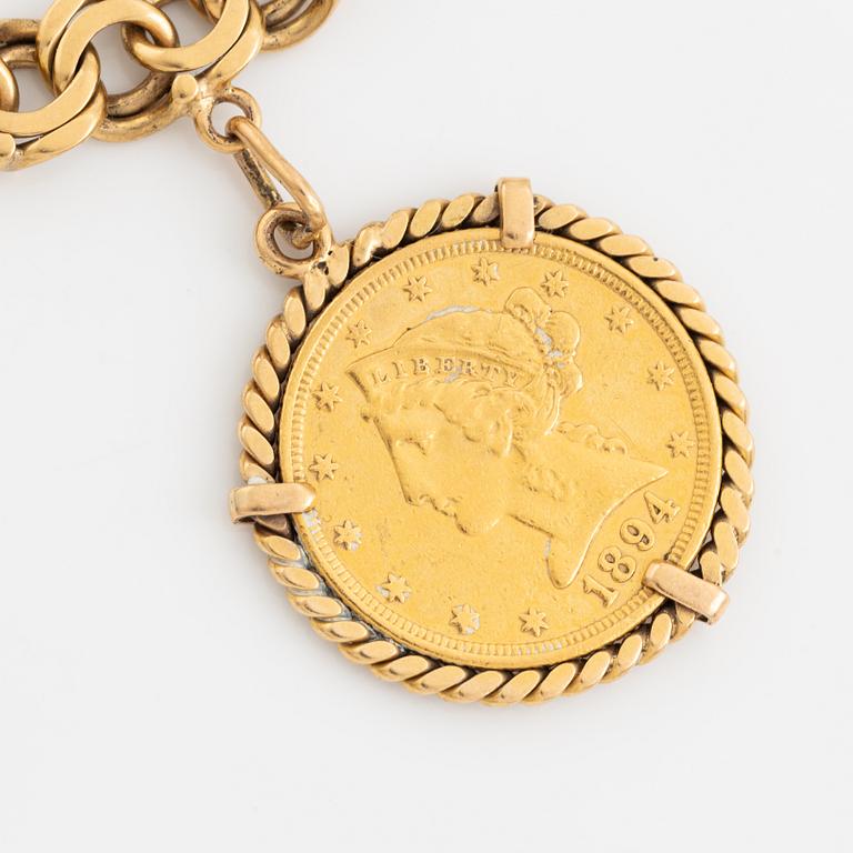 Armband guld bismarcklänk med berlocker med guldmynt.