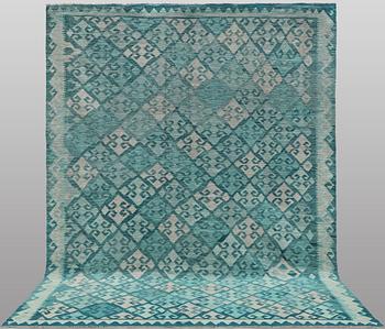 A Kelim carpet, 350 x 245 cm.