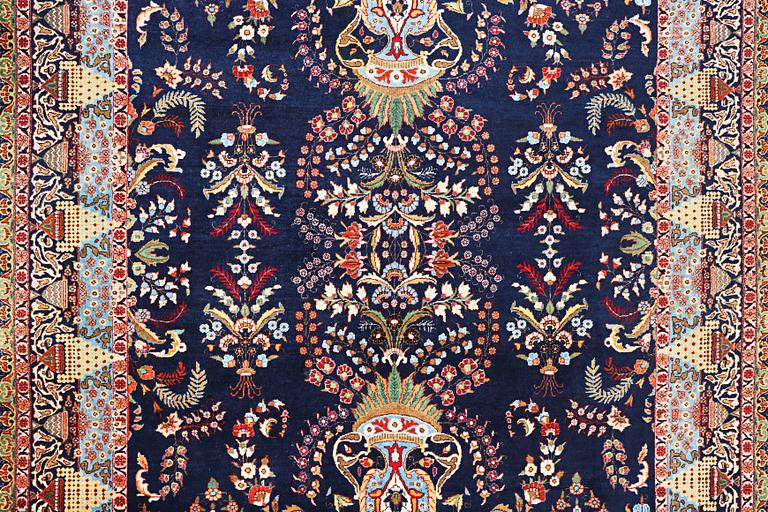 A Kashmar carpet, c. 356 x 260 cm.