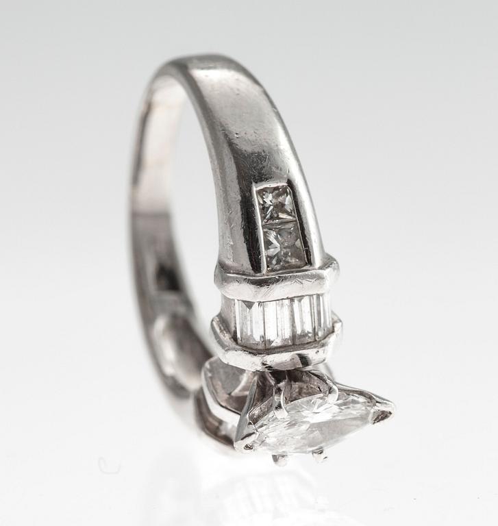 A RING, platinum. Navette, baguette and princess cut diamonds c. 1.30 ct. Size 17,5. Weight 9,0 g.