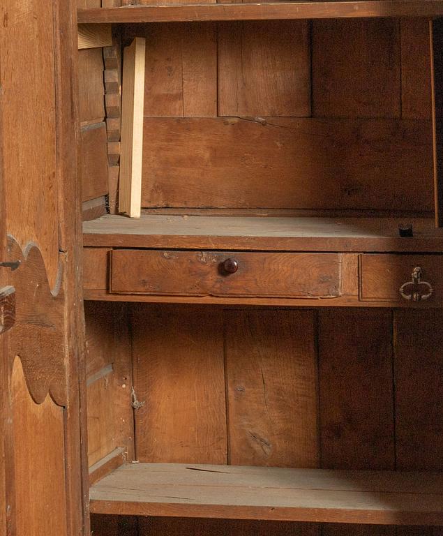 A french carved wooden cabinet, around 1900.