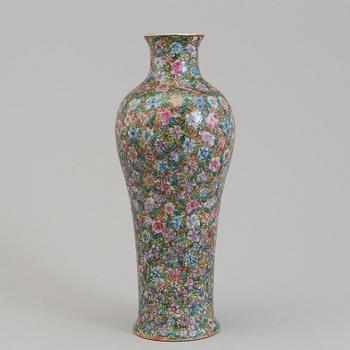 A Chinese 20th century famille rose 'mille fiore' vase, with Qianlong seal mark.