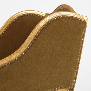 A French Louis Xv giltwood lit de repos, later part 18th century.