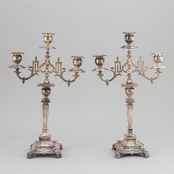 A pair of silver plated candelabras, early 20th century.
