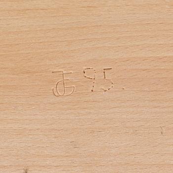 John-Erik Göransson, sculpture in wood, signed with monogram and dated JEG -95 underneath.
