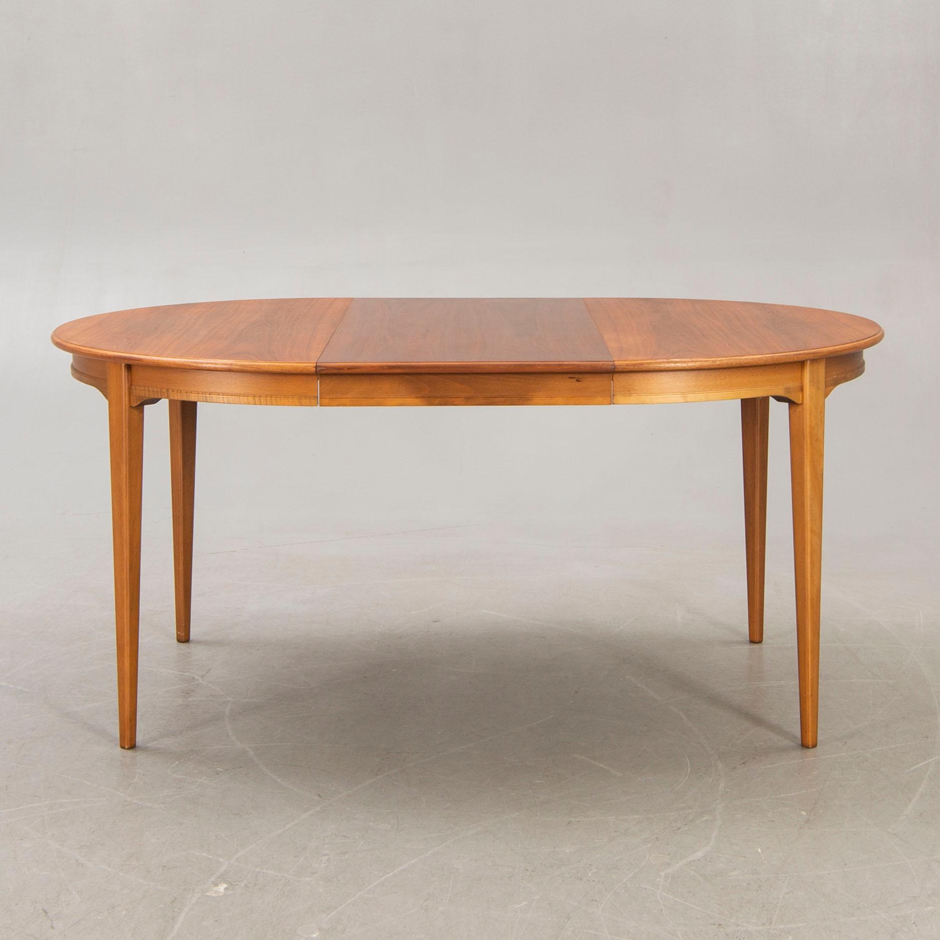 A 1960s Svante Skogh walnut dining table.