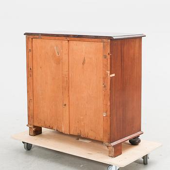 An early 1900s mahogany dresser.