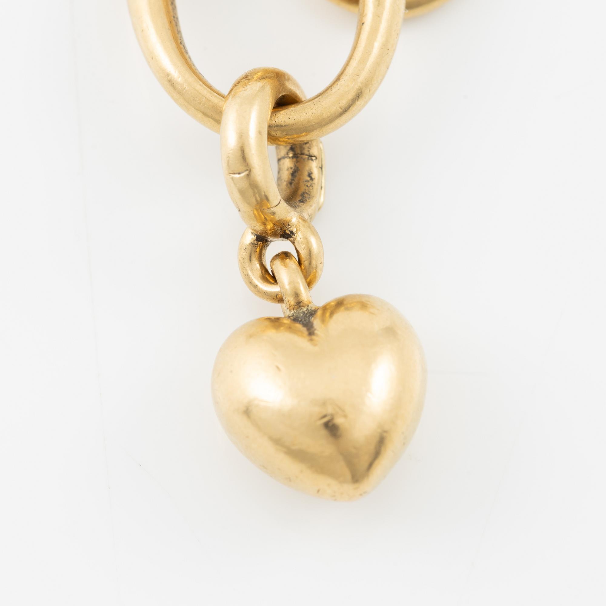 Charlotte Lynggaard, Ole Lynggaard, armband, 18K guld med berlocker i form av elefant, stjärna och hjärta.