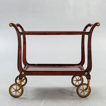 A mid 1900s mahogany serving trolley.