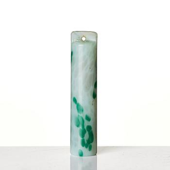 A group of carved nephrite and jade ornaments, China, Qing dynasty and older. (8 pieces).