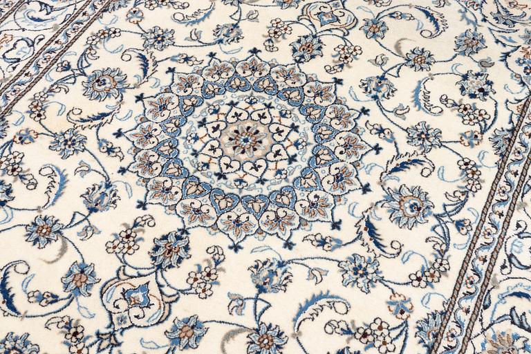 A Nain carpet, c. 275 x 195 cm.