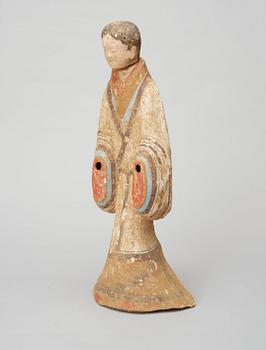A painted pottery figure of a court attendant, Han Dynasty (206 BC-220 AD).