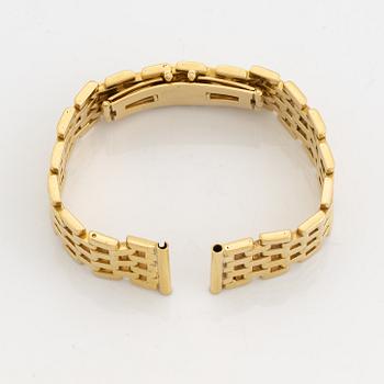 An 18K gold watch bracelet.