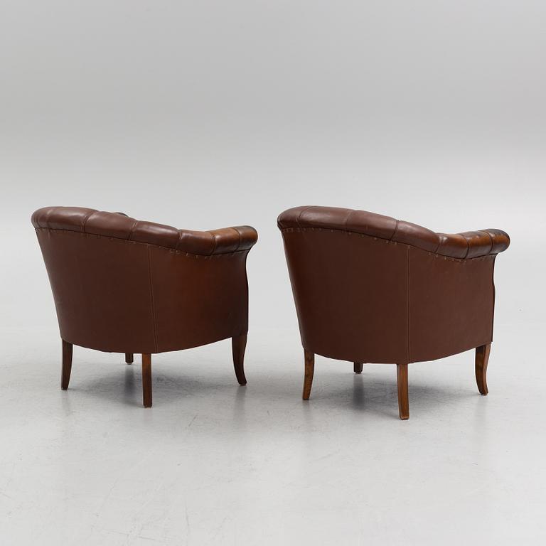 A pair of armchair, mid 20th Century.