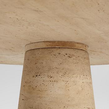 A travertine dining table, late 20th century.