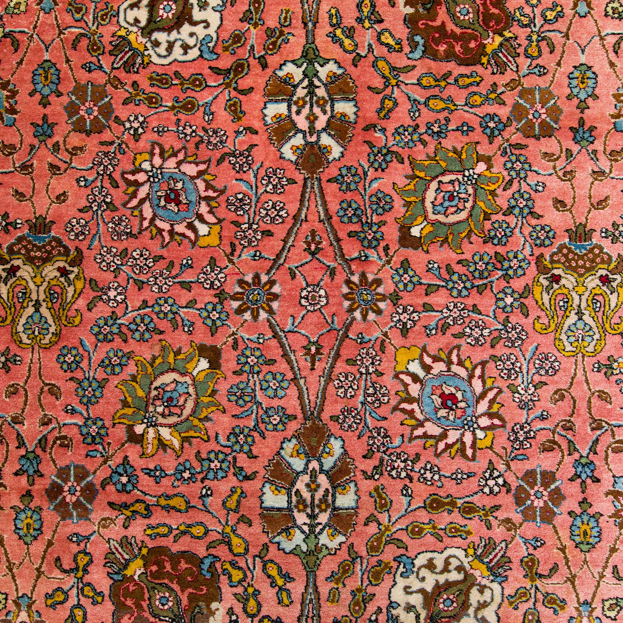 A Tbriz carpet of Safavid 'vase' design, approx. 397x295 cm.