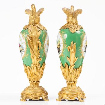 A pair of Louis XV-style gilt bronze and porcelain decorative ewers, France, later part 19th century.
