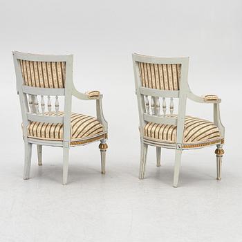 A pair of Gustavian style armchairs, 19th century.