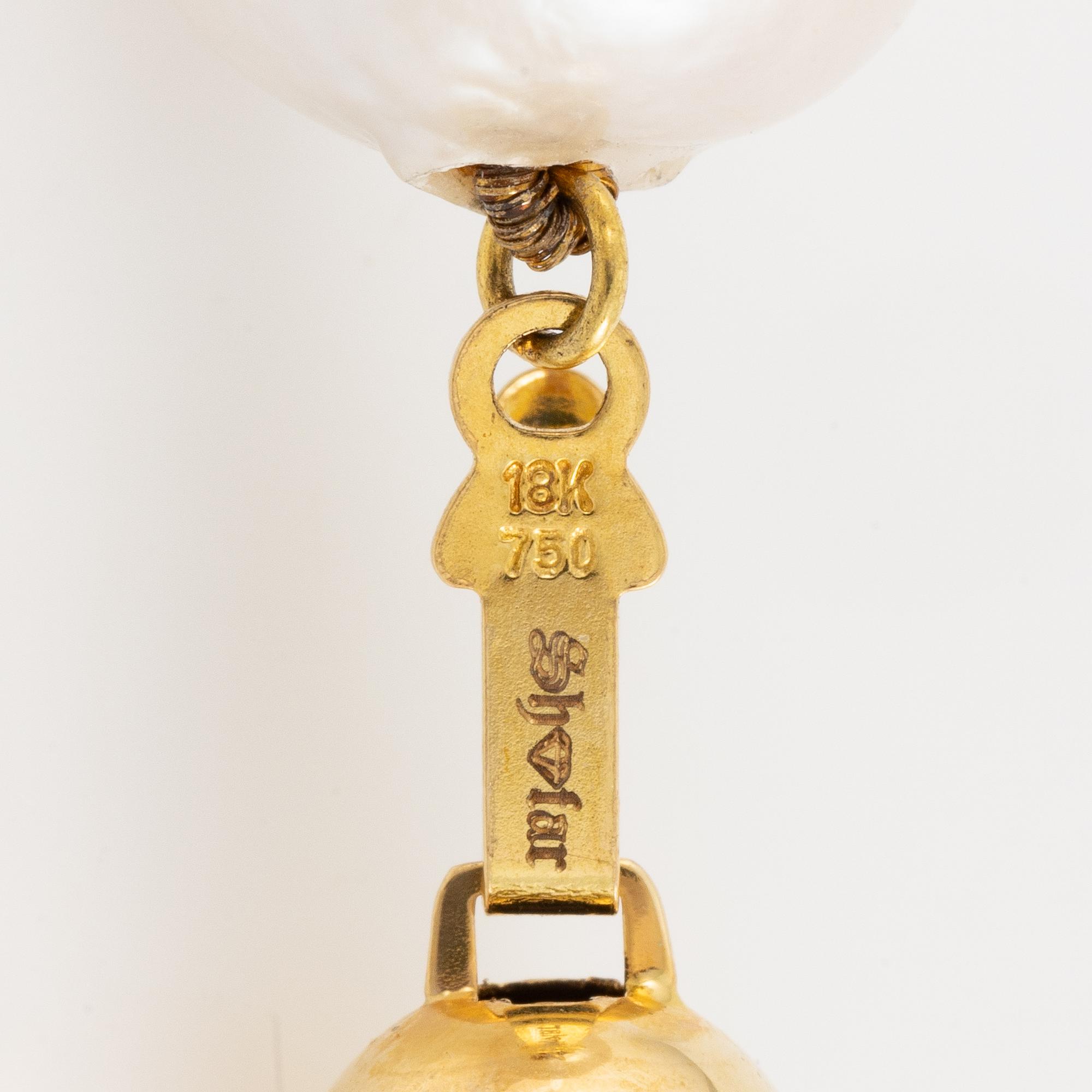 Collier med odlade sötvattenspärlor, lås 18K guld.