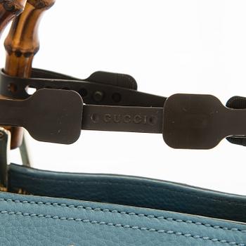 Gucci, a 'Bamboo shopper' bag.