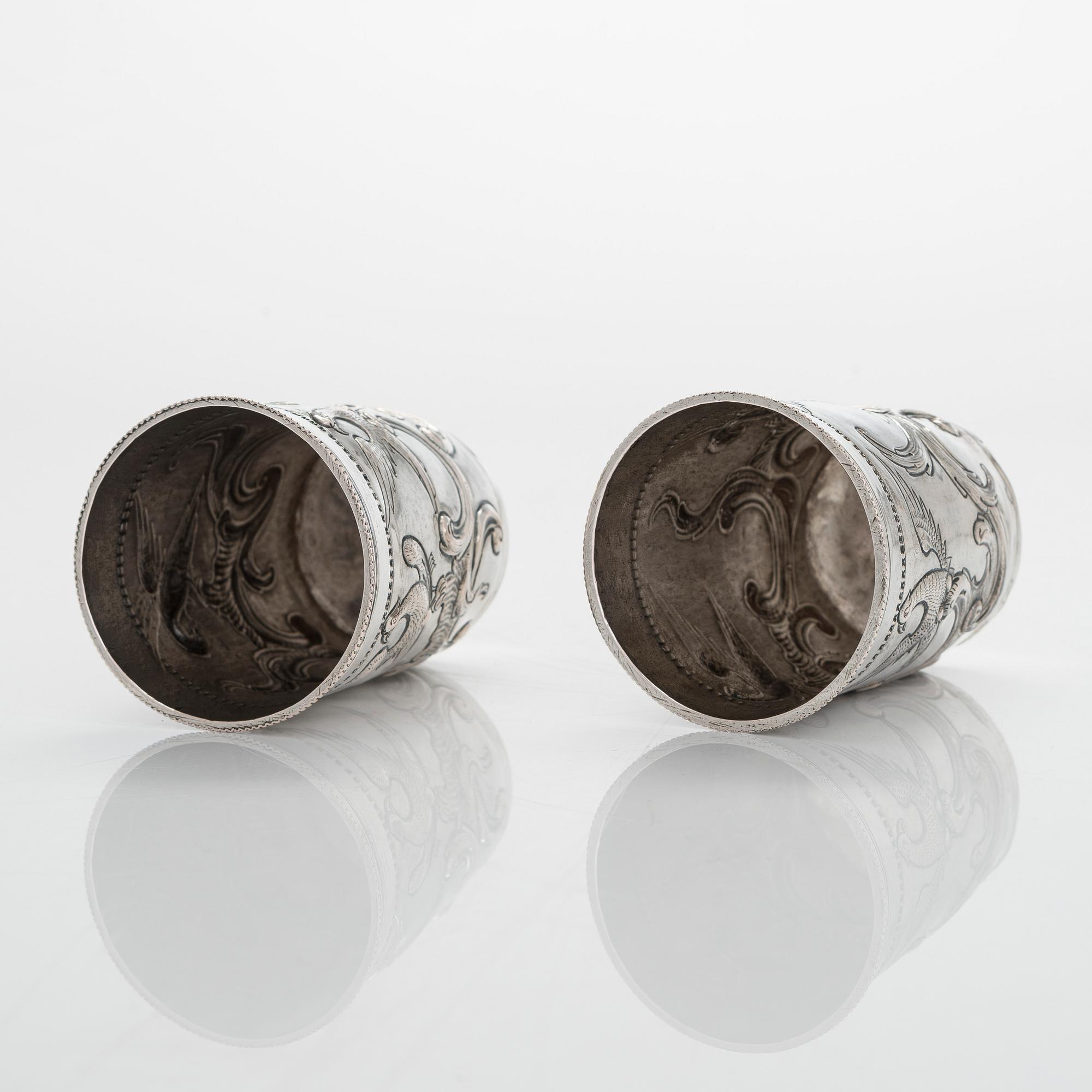 A pair of late 18th-century silver beakers, unknown maker's mark, alderman Alexei Kosirev, Moscow 1791.