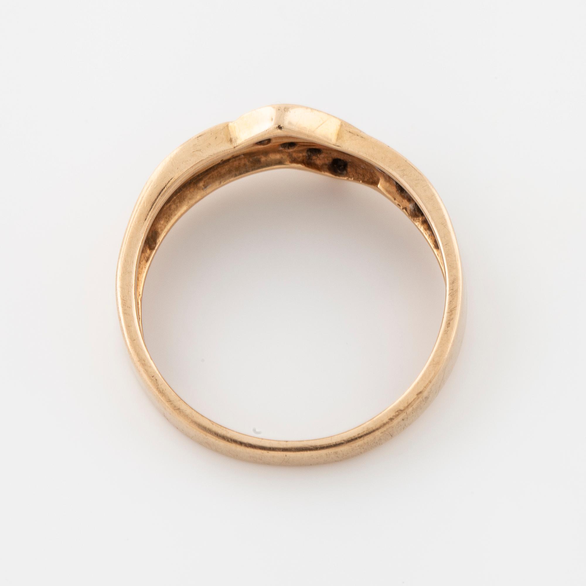 A single cut diamond ring.