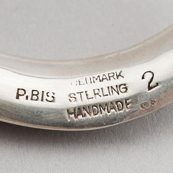 Two silver bracelets, including Denmark.